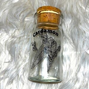 Vintage cardamom 1970s Wheaton glass spice jar.